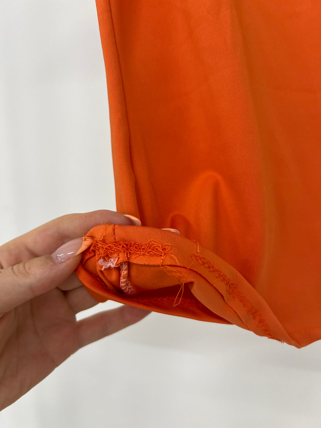TOP MIT SPAGHETTITRÄGERN FENJA ORANGE GR.M/38 (B-WARE)